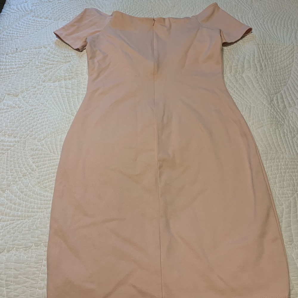 Lulu’s Light Pink color dress. Knee length.